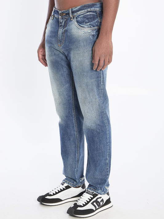 Denim pants with loose plaque