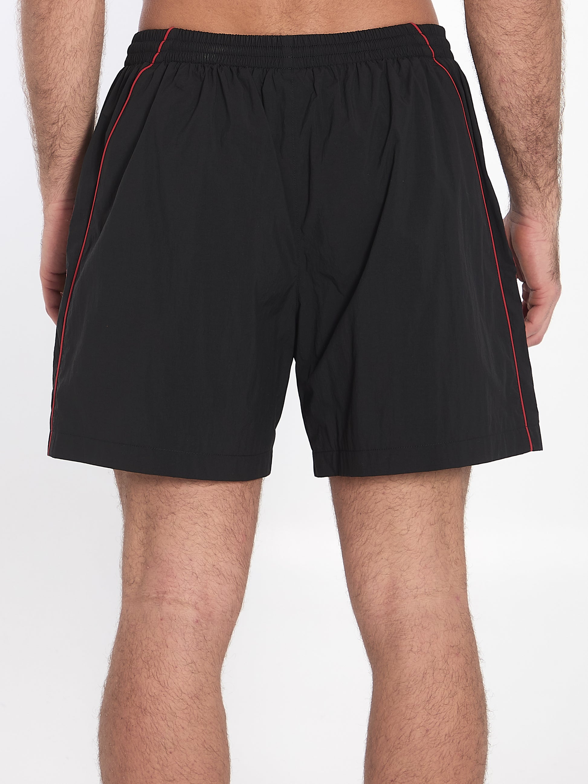 Bermuda shorts with red logo