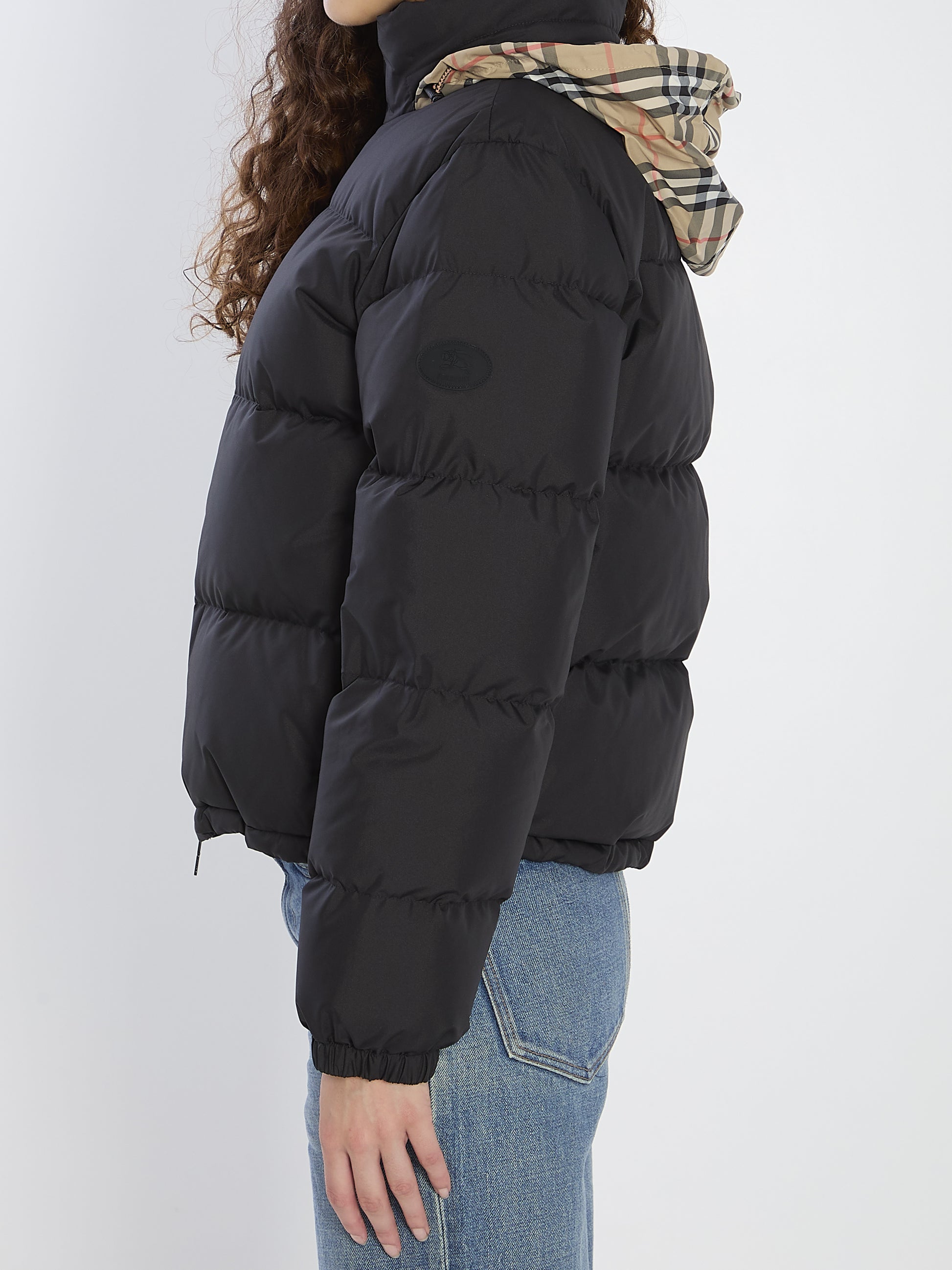 Puffer jacket with concealed hood