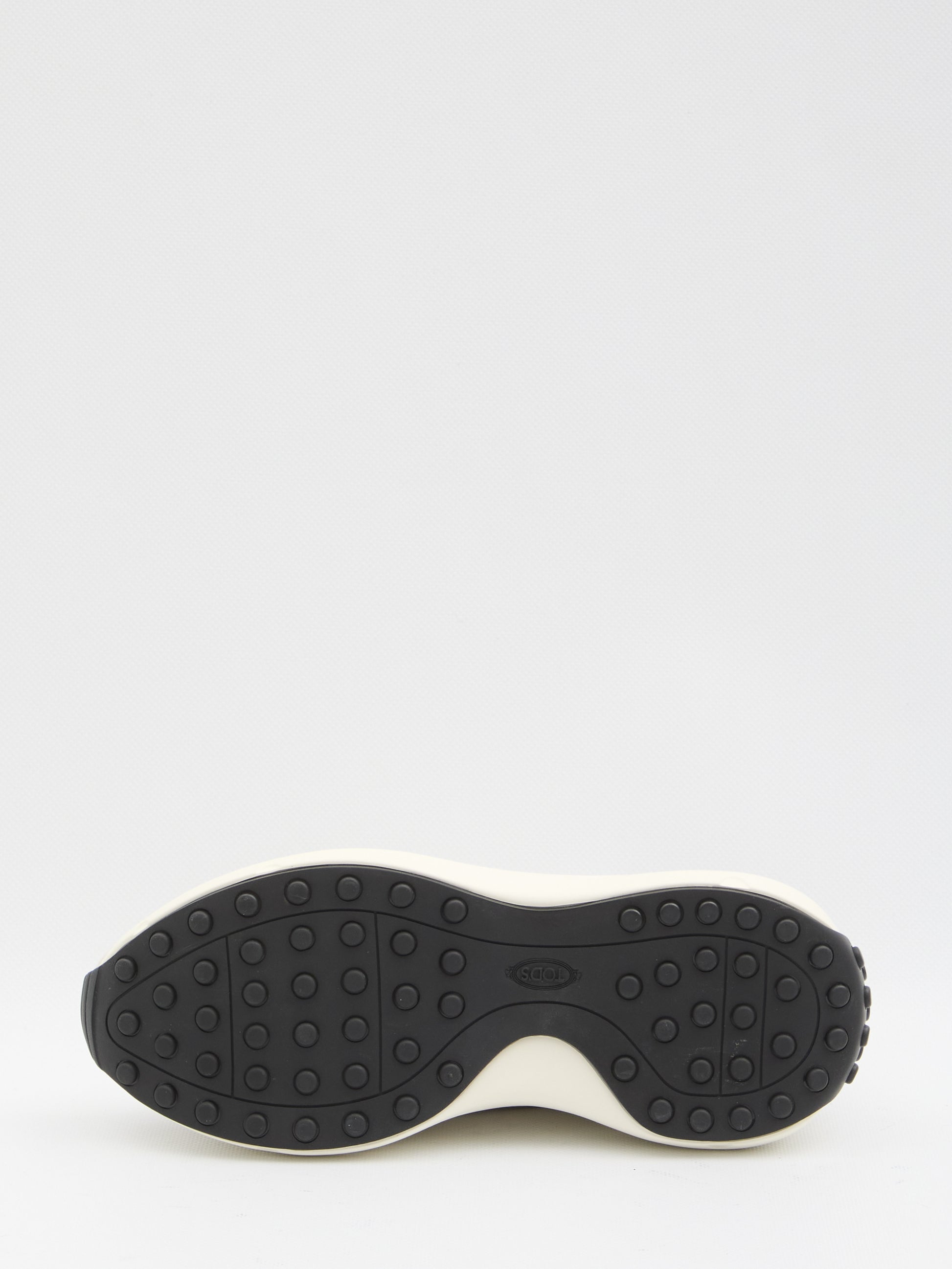 Sneakers in leather and fabric